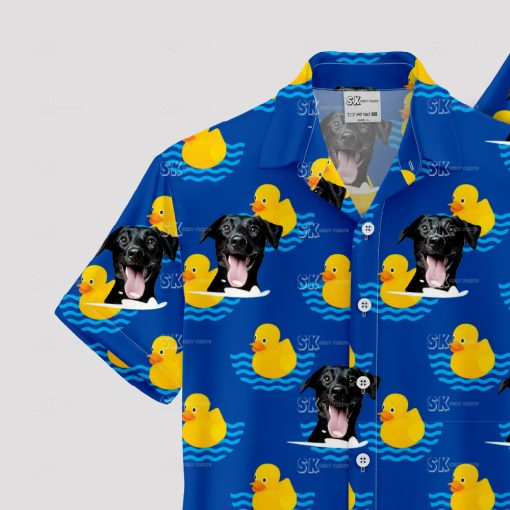 Blue Hawaiian shirt with black dog faces and yellow rubber ducks