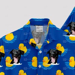 Blue Hawaiian shirt with black dog faces and yellow rubber ducks