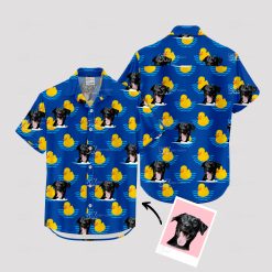 Blue Hawaiian shirt with black dog faces and yellow rubber ducks