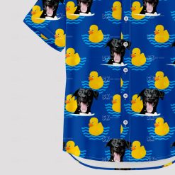 Blue Hawaiian shirt with black dog faces and yellow rubber ducks