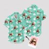 donald duck hawaiian shirt with swans and sunglasses face on turquoise