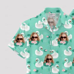 donald duck hawaiian shirt with swans and sunglasses face on turquoise