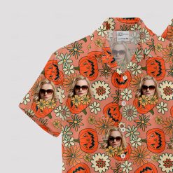 Orange Hawaiian shirt with pumpkin faces, flowers, and portraits pattern