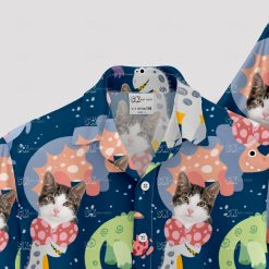 Colorful cat and cartoon dinosaur faces on Hawaiian shirt