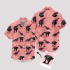 Pink dinosaur aloha shirt with dog faces and palm tree patterns