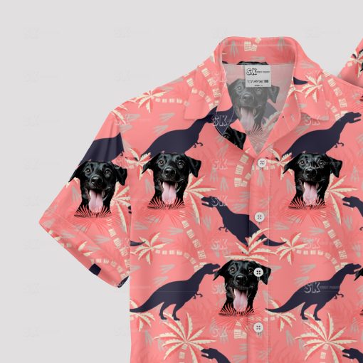 Pink dinosaur aloha shirt with dog faces and palm tree patterns