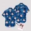 Blue Hawaiian shirt with dinosaur, cat face, and playful pattern
