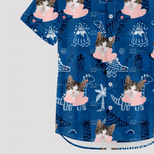 Blue Hawaiian shirt with dinosaur, cat face, and playful pattern