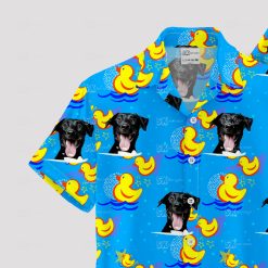 Blue Hawaiian shirt with black dog faces and yellow rubber ducks