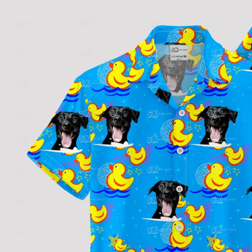 Blue Hawaiian shirt with black dog faces and yellow rubber ducks