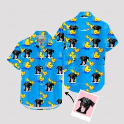 Blue Hawaiian shirt with black dog faces and yellow rubber ducks