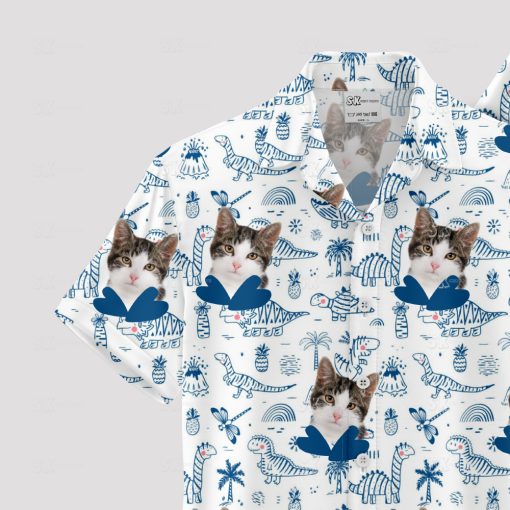 Cat face and dinosaurs on tropical Hawaiian shirt pattern