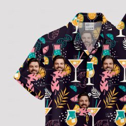 Black men's Hawaiian shirt with tropical cocktail and face pattern