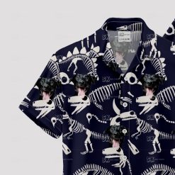 t rex hawaiian shirt with dinosaur skeletons and smiling black dog
