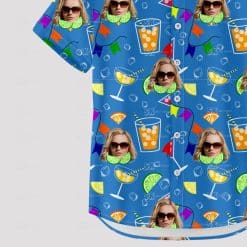 Blue Hawaiian shirt with cocktail glasses, faces, and party flags pattern