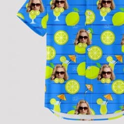 Blue tropical shirt with citrus slices, woman's face, cocktail glasses