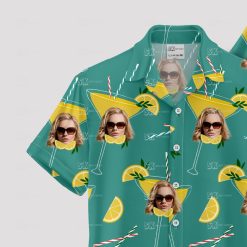 Mint green Hawaiian shirt with woman face in cocktail glass, teal background