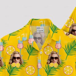 Yellow Hawaiian shirt with woman's face, citrus, palm leaves, cocktails