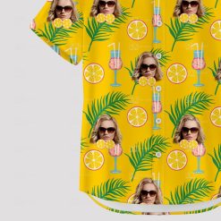 Yellow Hawaiian shirt with woman's face, citrus, palm leaves, cocktails