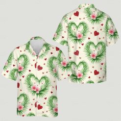 His and hers Hawaiian outfits with green heart leaf pattern and pink flowers