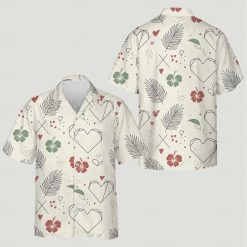 Matching Hawaiian outfits for couples with hearts, hibiscus, palm leaves, dots