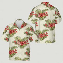 Matching tropical outfits for couples with red and pink flowers, green leaves