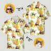 A colorful hawaiian button down shirt women's design with cat and woman faces, pineapples, and tropical leaves