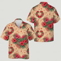 Couples Hawaiian outfits featuring vibrant red hibiscus flowers, green leaves, and red hearts on beige shirts
