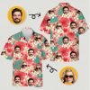 Couples matching tropical outfits with red flowers, green leaves, and custom photos on a coral shirt