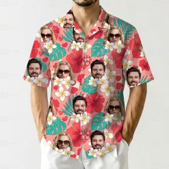 Couples matching tropical outfits with faces, tropical leaves, and red hibiscus flowers