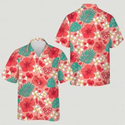 Couples matching tropical outfits with red hibiscus and plumeria flower pattern on pink shirts