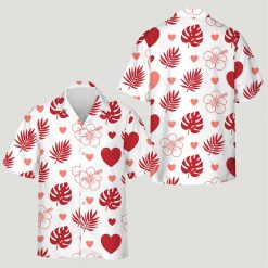 Couples tropical outfits featuring red and pink hibiscus and heart patterns on Hawaiian shirts