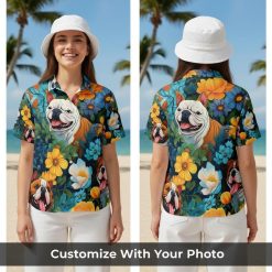 Hawaiian shirt dog print for women with playful bulldogs and bright florals on dark fabric