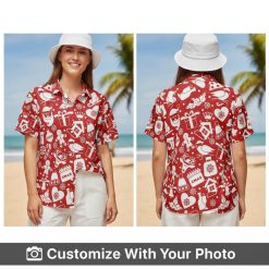 Red Christmas-themed Hawaiian shirt with gifts, snowflakes, and reindeer worn by a smiling woman