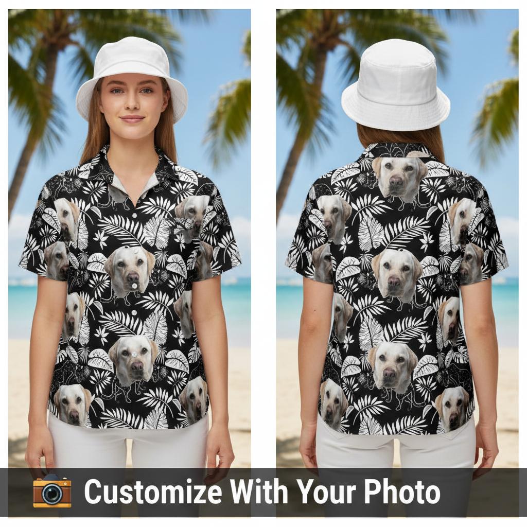 Black Hawaiian shirt with custom dog face and tropical leaves, worn by a smiling woman at a café
