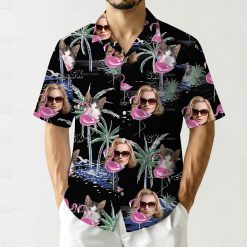 flamingo hawaiian shirt with pink flamingos, palm trees, faces, and cats on black fabric