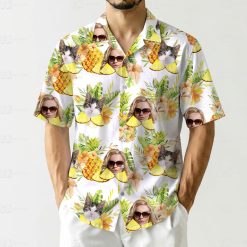 hawaiian button down shirt women's pattern with pineapples, cats, people wearing sunglasses, and leafy florals
