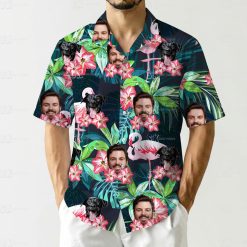 Matching dog and owner Hawaiian shirts with black dog faces, person faces, flamingos, and leaves