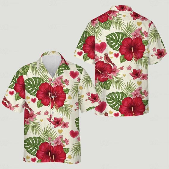 Matching Hawaiian outfits for couples with red hibiscus, hearts, and bird