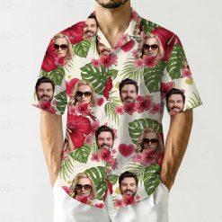 Matching Hawaiian outfits for couples with hibiscus, leaves, hearts, smiling faces