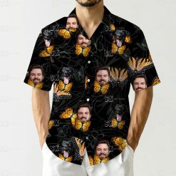 mens big and tall hawaiian shirts featuring orange butterflies, man faces, and black dog faces on a dark leaf pattern