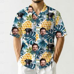 Mens funny Hawaiian shirt with dog faces, human faces, tropical leaves, and yellow pineapples