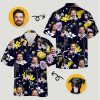 Mens tropical shirt with vibrant floral pattern, butterflies, and dog and man faces