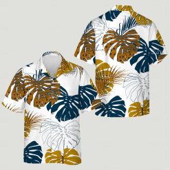 womens aloha shirt with bold tropical leaves in yellow and deep blue on a white background
