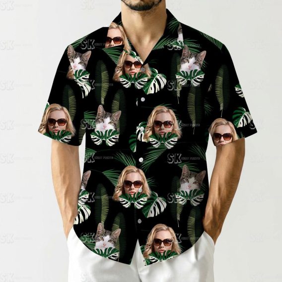 Womens hawaiian shirts nearby show a black shirt with cats, sunglasses faces and tropical leaves