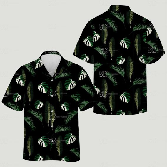 womens hawaiian shirts nearby featuring green monstera and palm leaves on black fabric