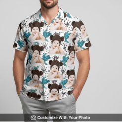 Hawaiian shirt with baby face and sea turtle print worn by man on golden beach evening