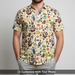 Man in beige cartoon pirate Hawaiian shirt with nautical ships and treasure maps