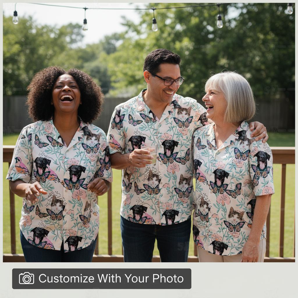 Group of people wearing matching tropical shirts on wooden deck with string lights