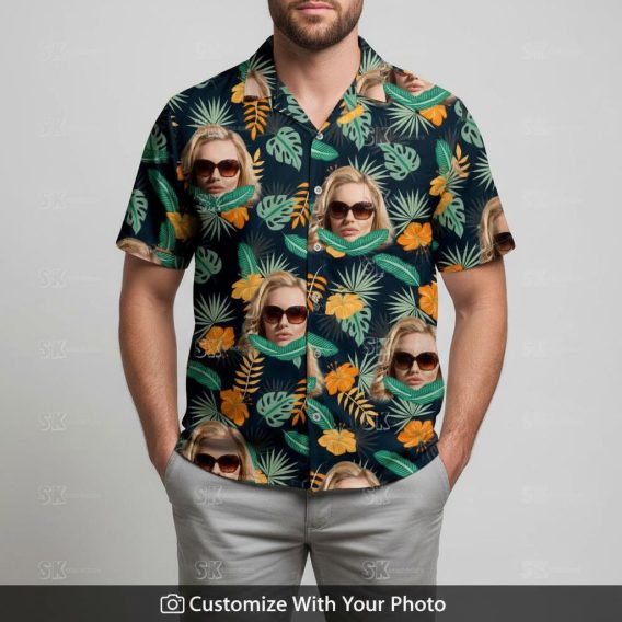 Man wearing black Hawaiian shirt with hibiscus flowers and sunglasses face print